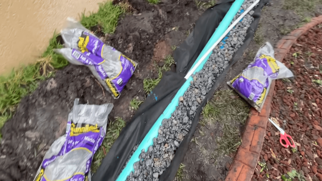 Add-Stone-Around-French-Drain